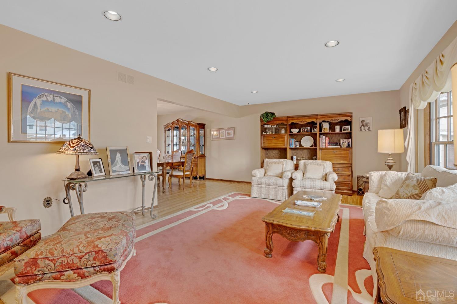 5 Diamond Drive Edison, NJ 08820 - Photo 8 of 35 a living room with furniture and wooden floor