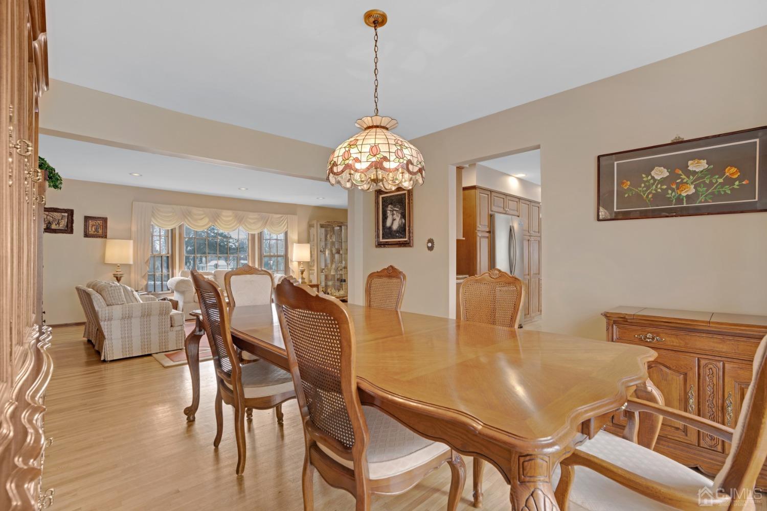 5 Diamond Drive Edison, NJ 08820 - Photo 10 of 35 a dining room with furniture and chandelier