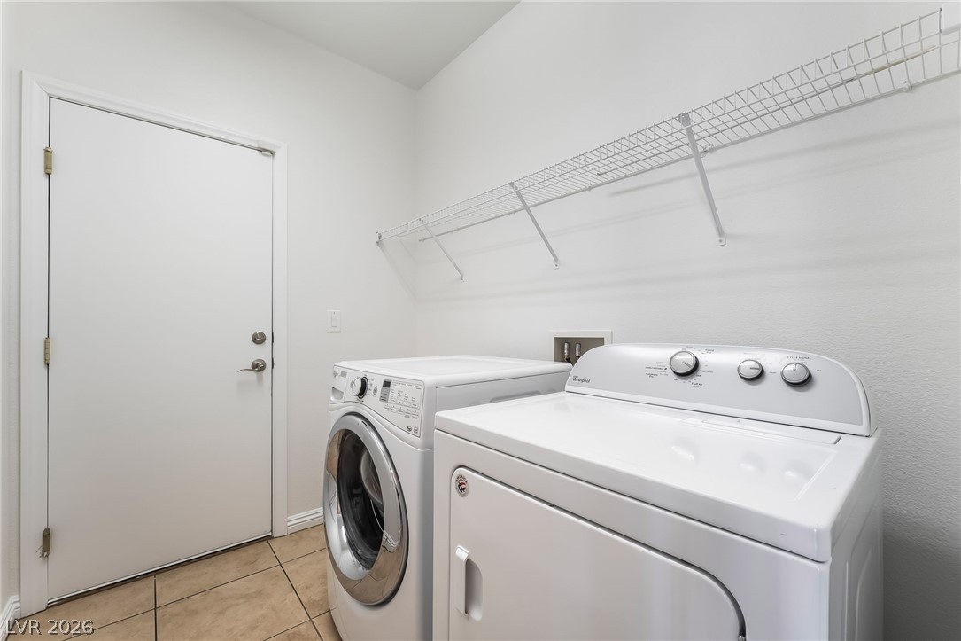 3175 Via Seranova Henderson, NV 89044 - Photo 34 of 45 This laundry room offers convenient amenities for daily living.