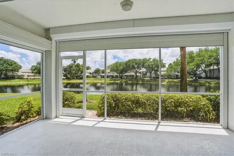 a view of a lake from a room with a lake view