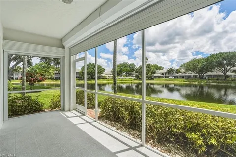 a view of a lake from a balcony