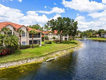 a view of a house with a big yard