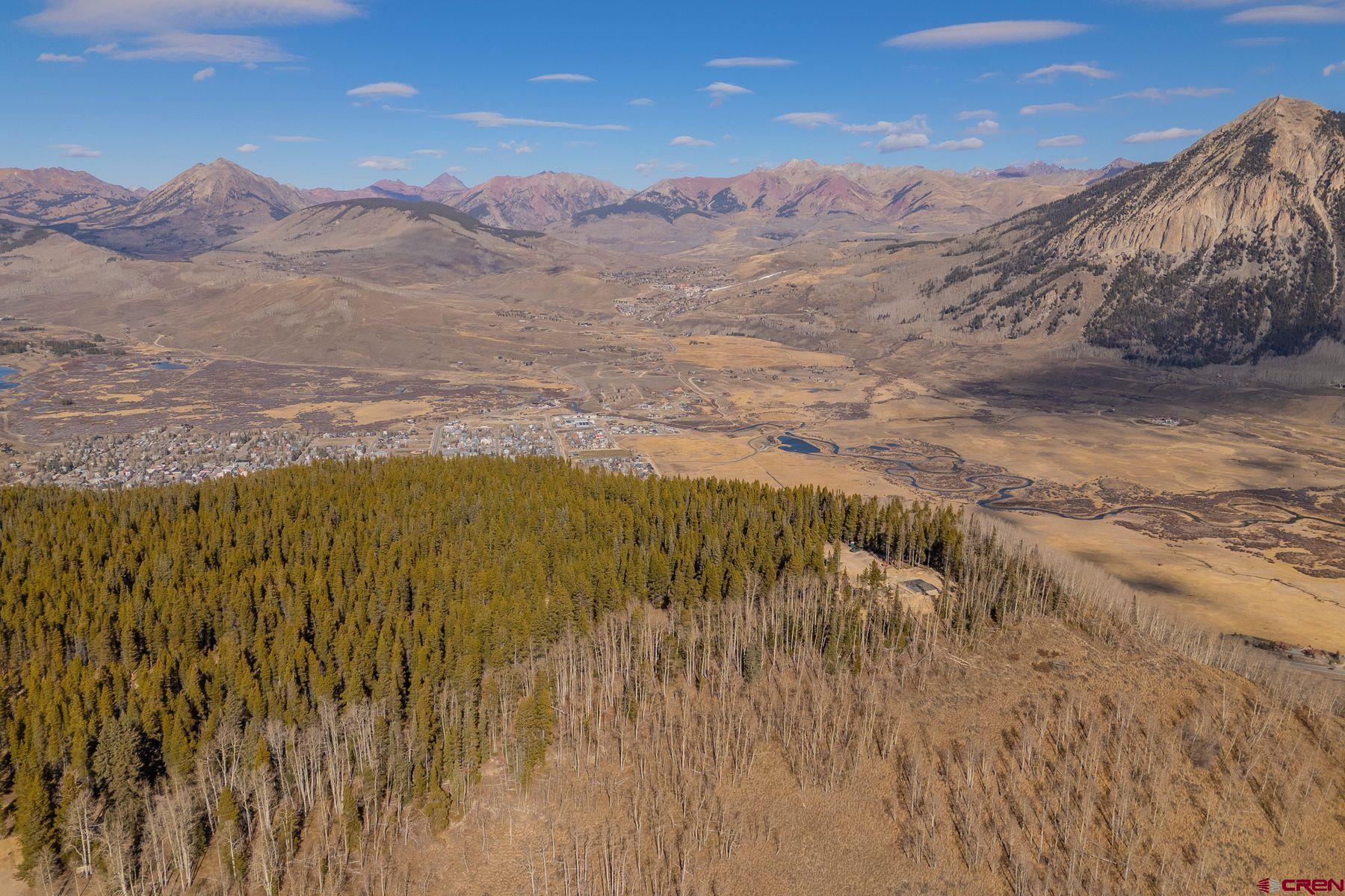 997 Saddle Ridge Road Crested Butte, CO 81224 - Photo 17 of 45 a view of an lake and a mountain
