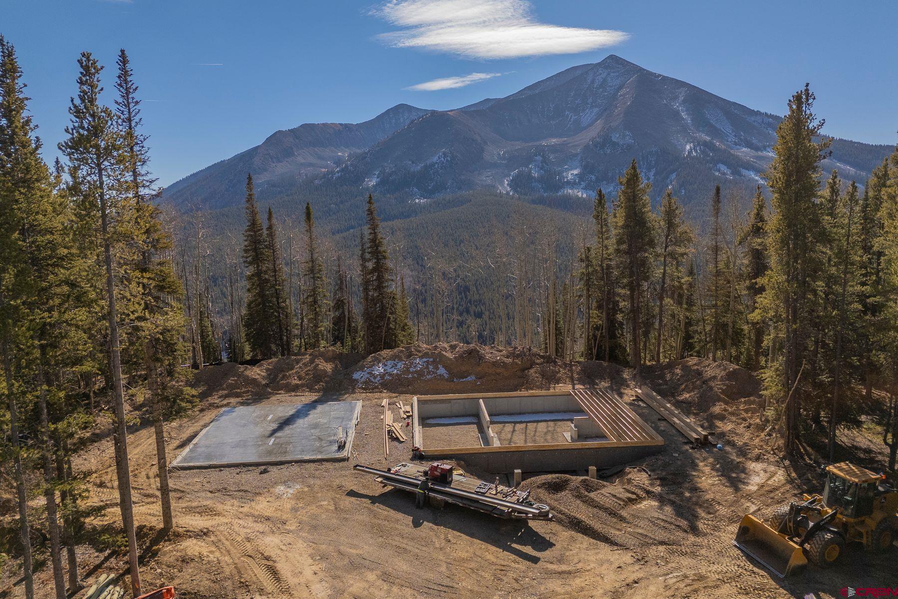 997 Saddle Ridge Road Crested Butte, CO 81224 - Photo 26 of 45 a view of a ocean with a mountain