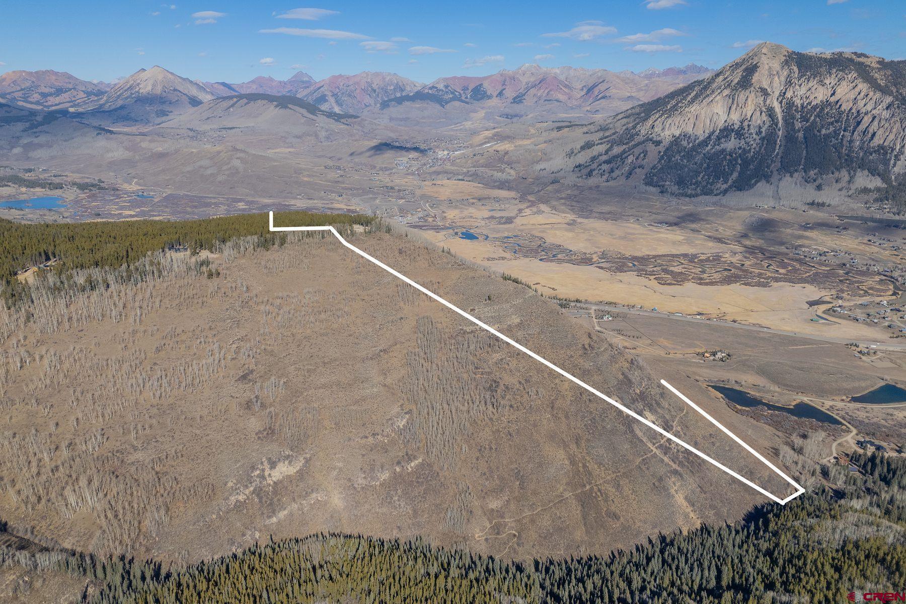 997 Saddle Ridge Road Crested Butte, CO 81224 - Photo 26 of 43 a view of a dry yard with mountain view