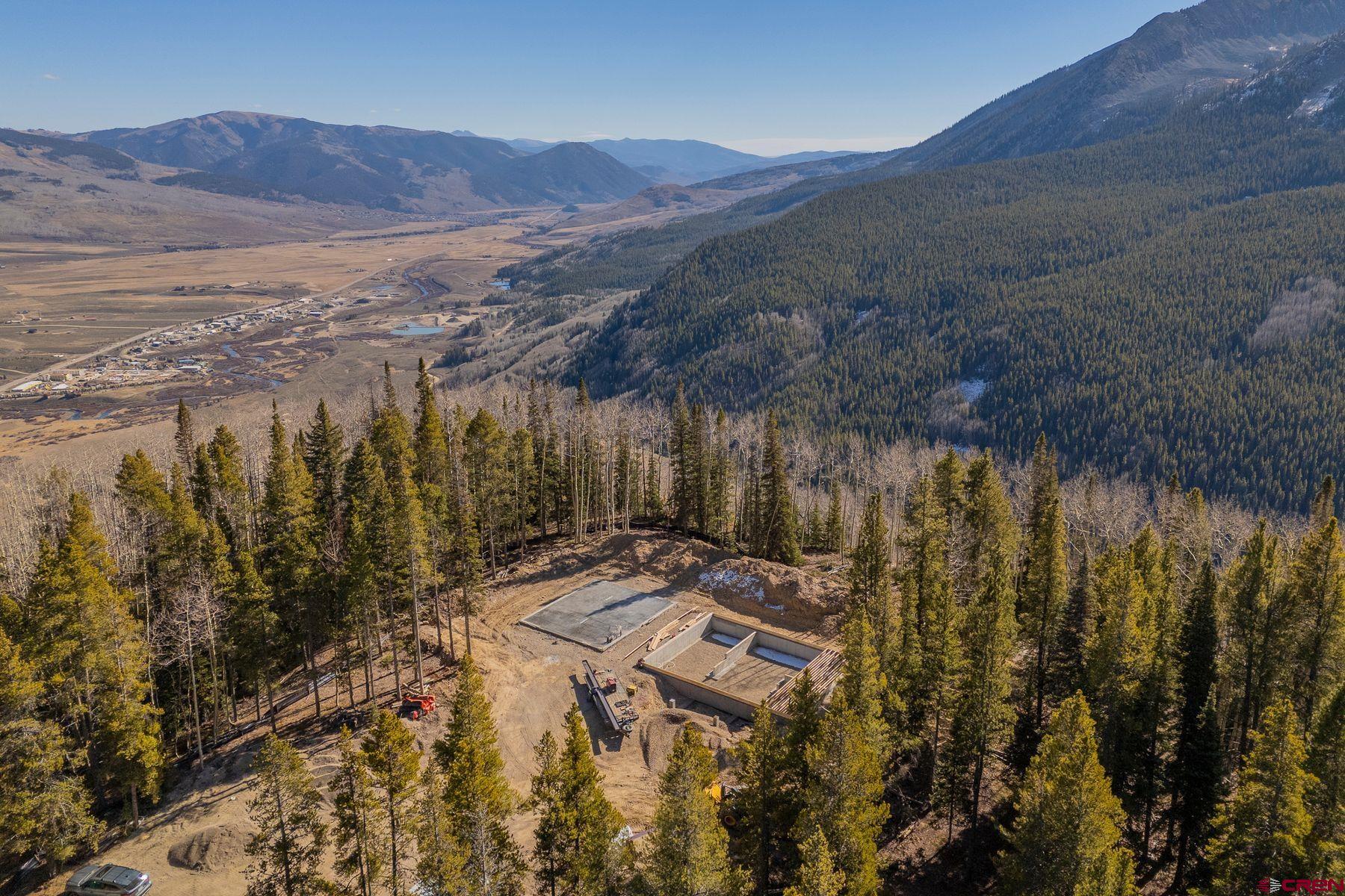 997 Saddle Ridge Road Crested Butte, CO 81224 - Photo 38 of 43 a view of a town with mountains in the background