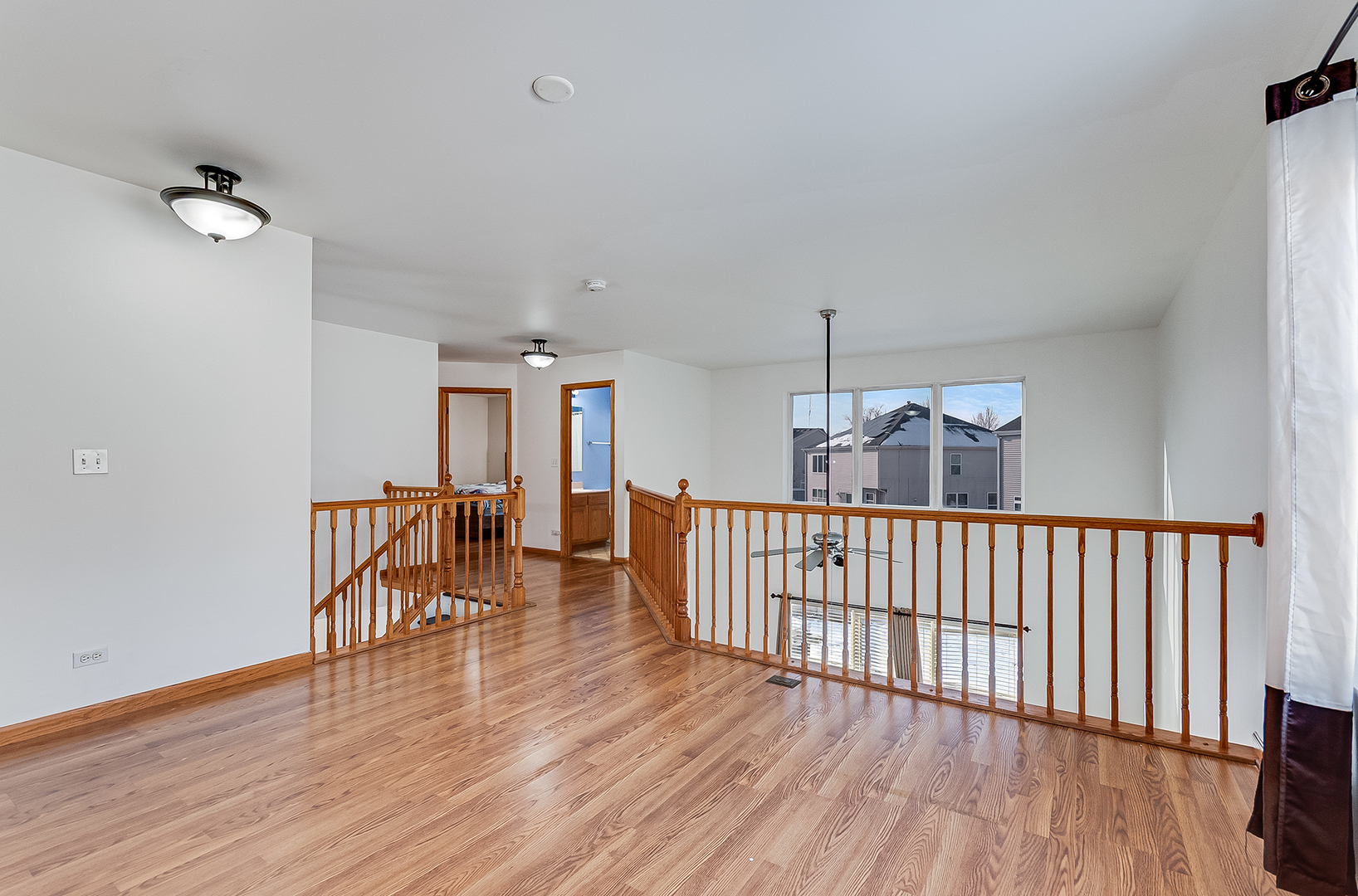 1544 Suncrest Lane Bolingbrook, IL 60490 - Photo 15 of 29 a view of a chairs and wooden floor in a room