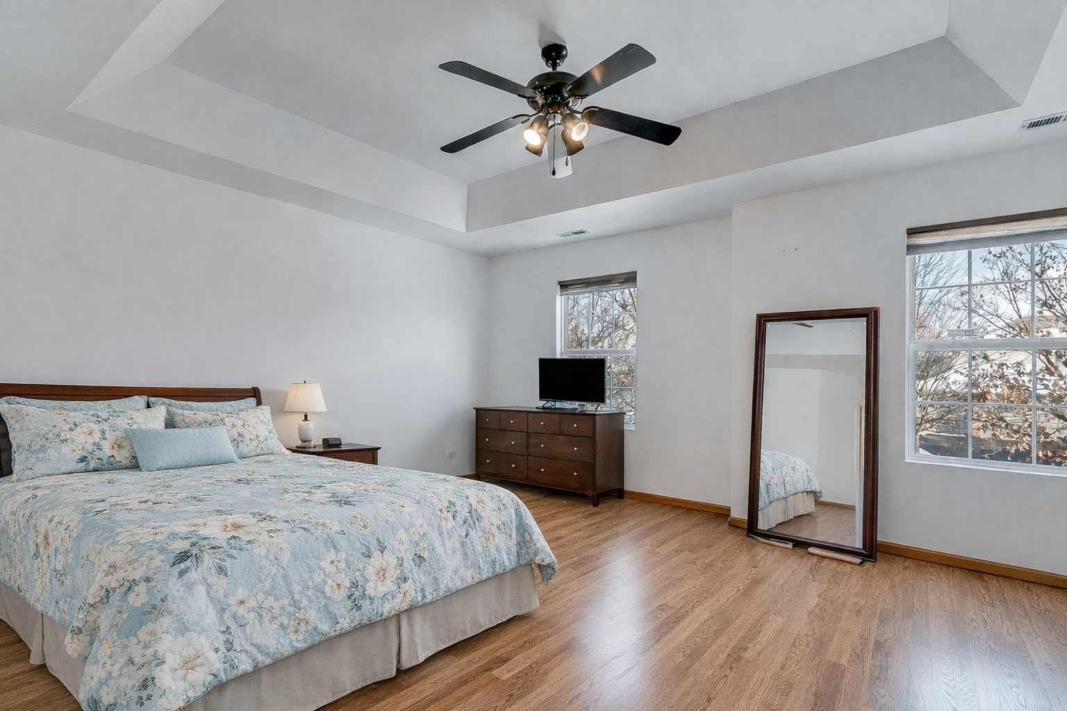 1544 Suncrest Lane Bolingbrook, IL 60490 - Photo 16 of 29 a bedroom with a large bed and a large window