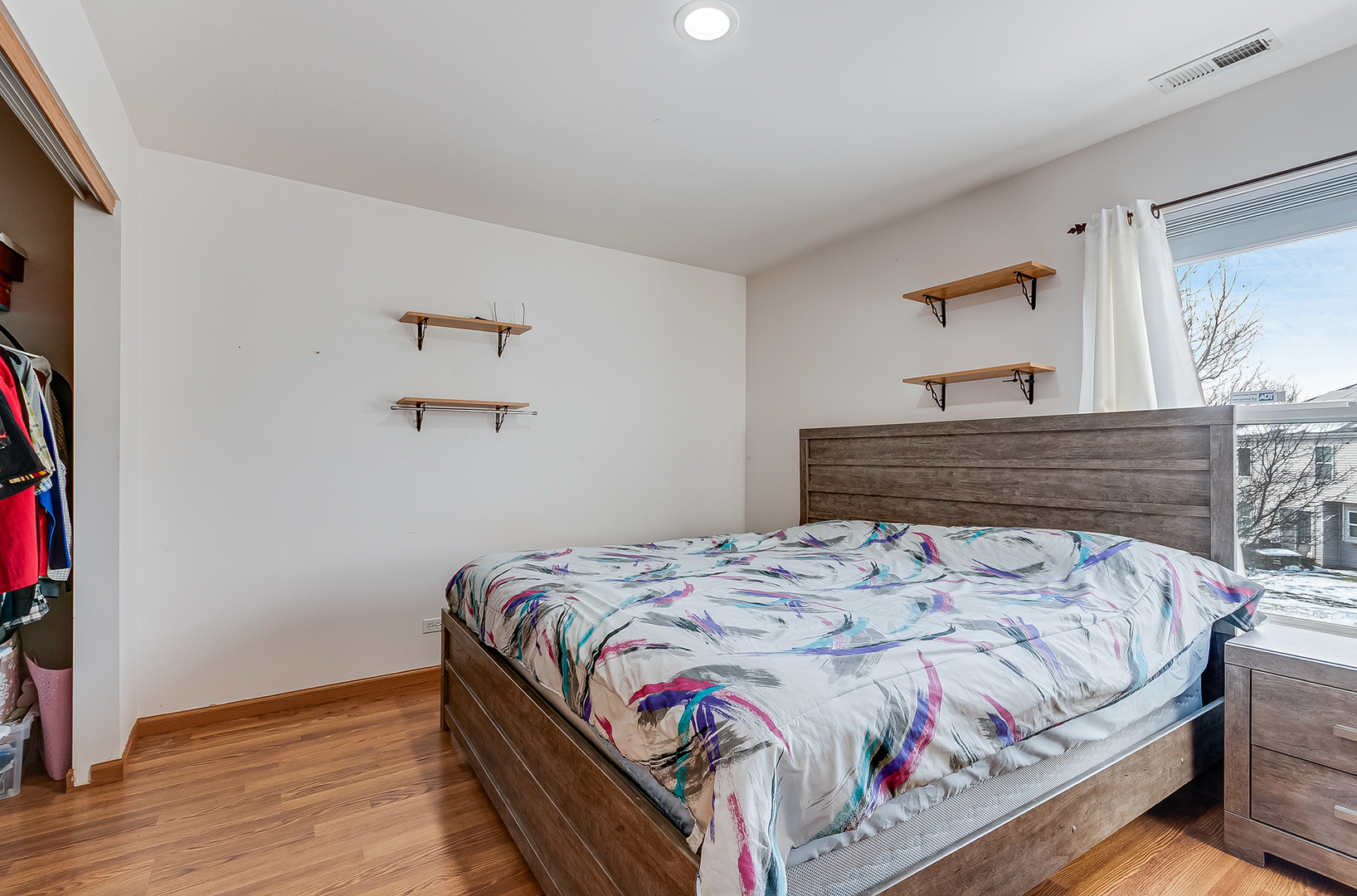 1544 Suncrest Lane Bolingbrook, IL 60490 - Photo 22 of 29 a bedroom with a bed and a window