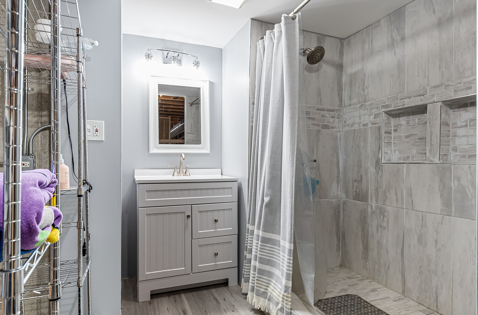 1544 Suncrest Lane Bolingbrook, IL 60490 - Photo 27 of 29 a bathroom with a sink vanity and shower
