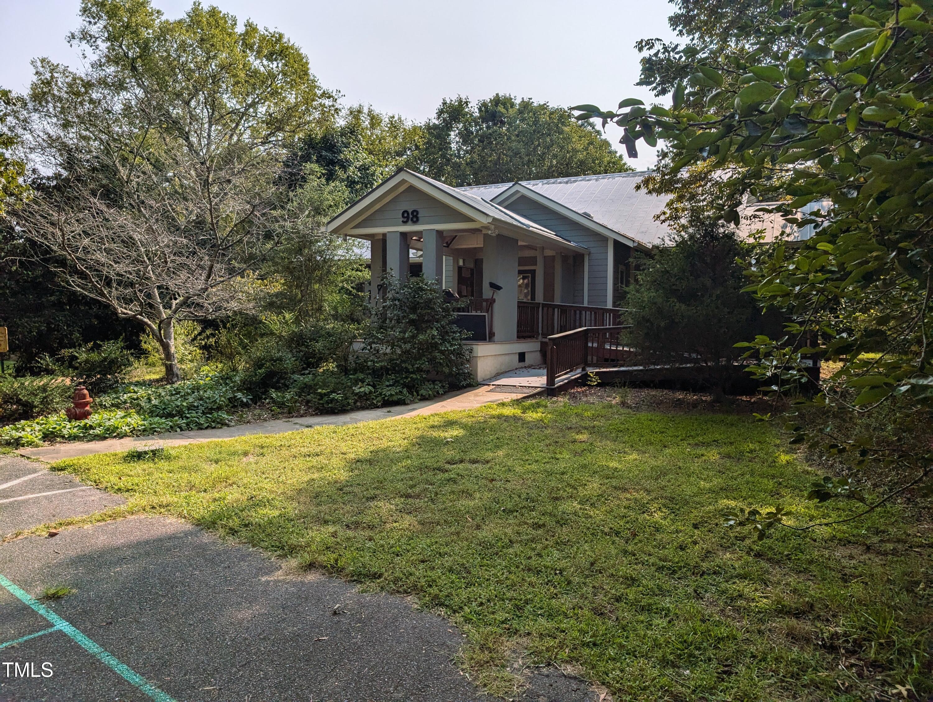 136 Solterra Way Durham, NC 27705 - Photo 9 of 20 a view of a house with backyard and sitting area