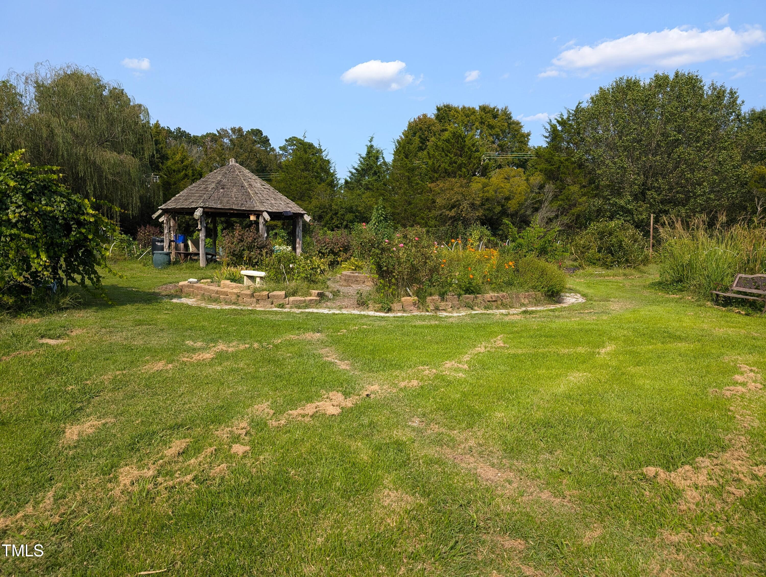 136 Solterra Way Durham, NC 27705 - Photo 10 of 20 a front view of house with yard and green space