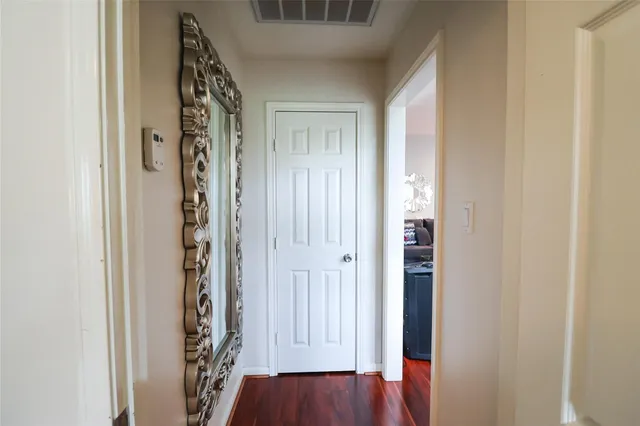a bathroom with a double vanity sink mirror and shower