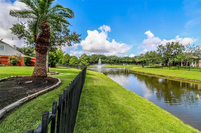 a view of a park with swings and slides