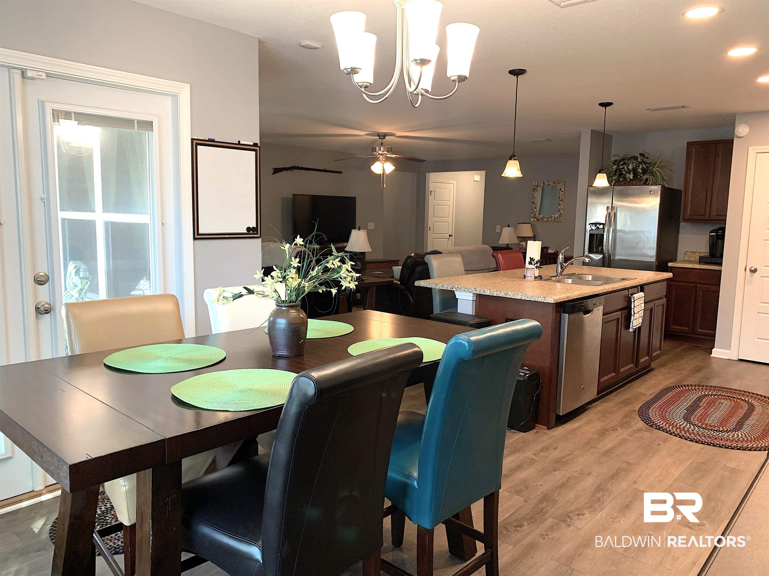12092 Chaucer Avenue Daphne, AL 36526 - Photo 8 of 27 Dining to Kitchen