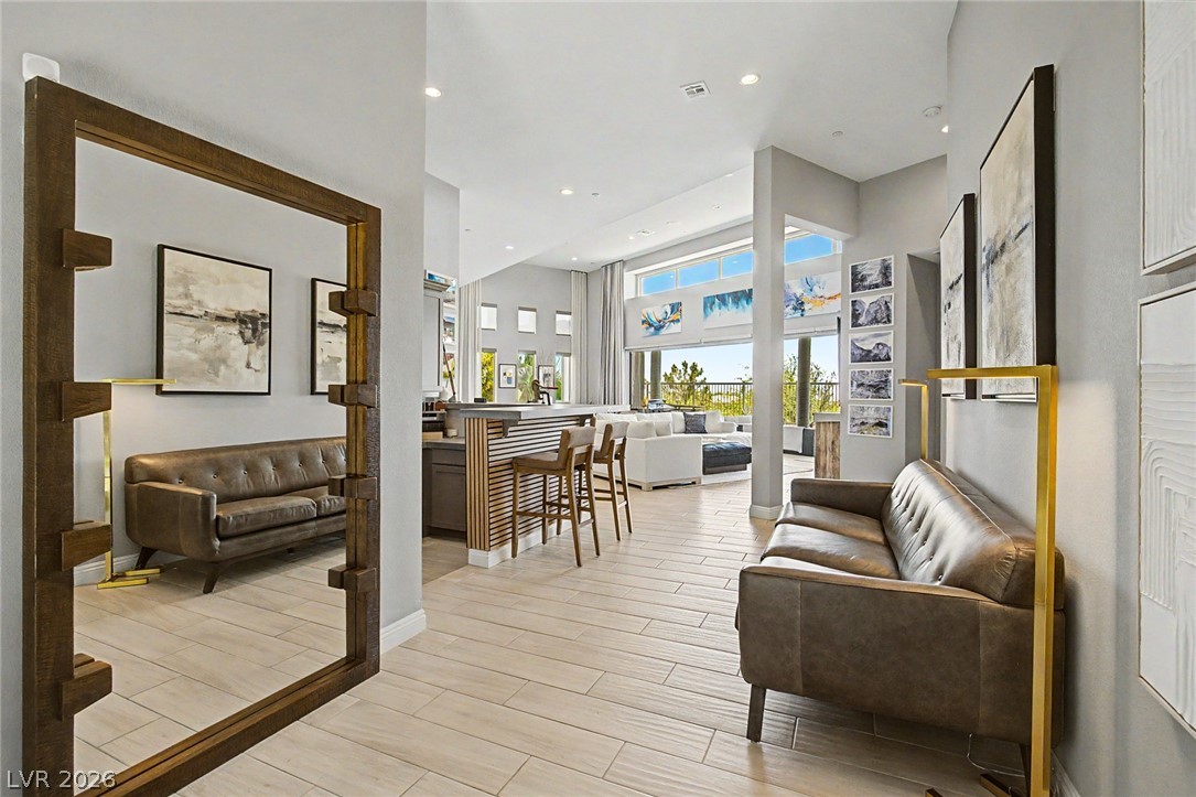 6014 Willow Ridge Court Las Vegas, NV 89135 - Photo 11 of 99 This airy open-concept living area with abundant natural light offers seamless indoor-outdoor living.