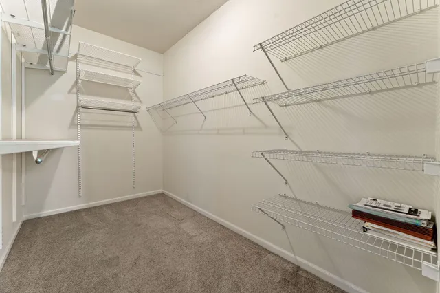 a view of a room with racks on the wall