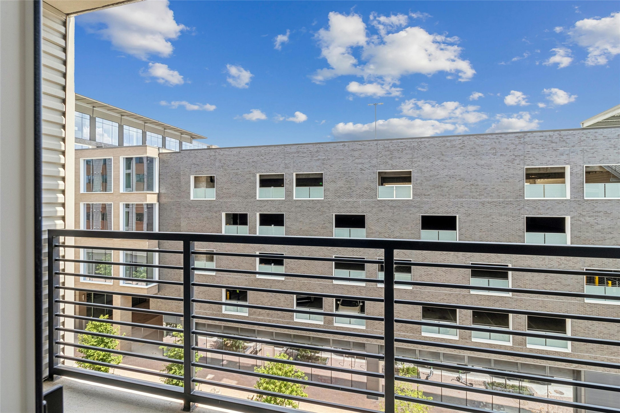 1701 Simond Avenue, Unit 401 Austin, TX 78723 - Photo 12 of 19 Private balcony off the living room
