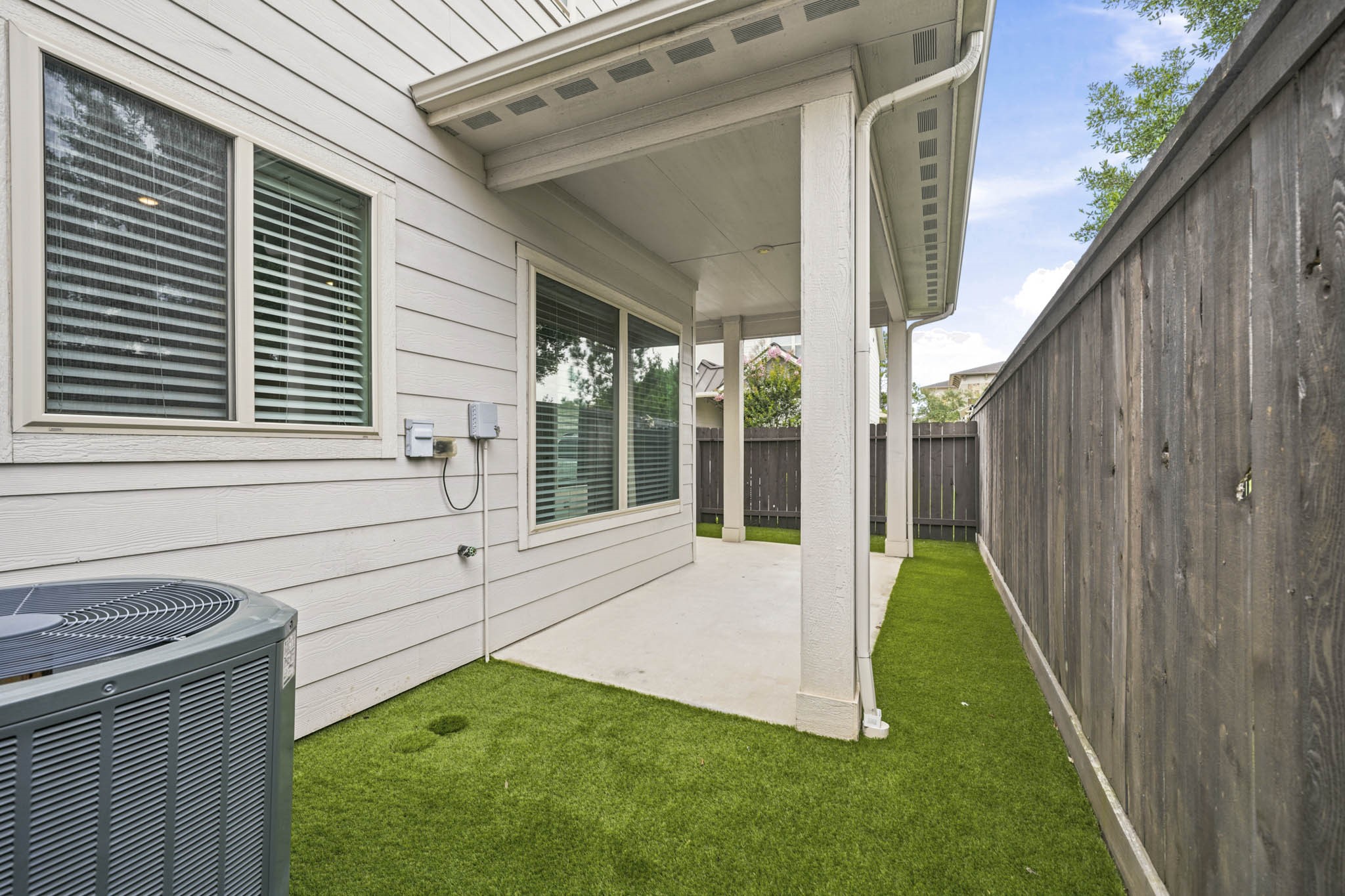 4103 Tranquil Square Road Houston, TX 77043 - Photo 37 of 39 The shaded covered patio blends comfort and charm, offering ample room for greenery, flowering pots and outdoor relaxation.