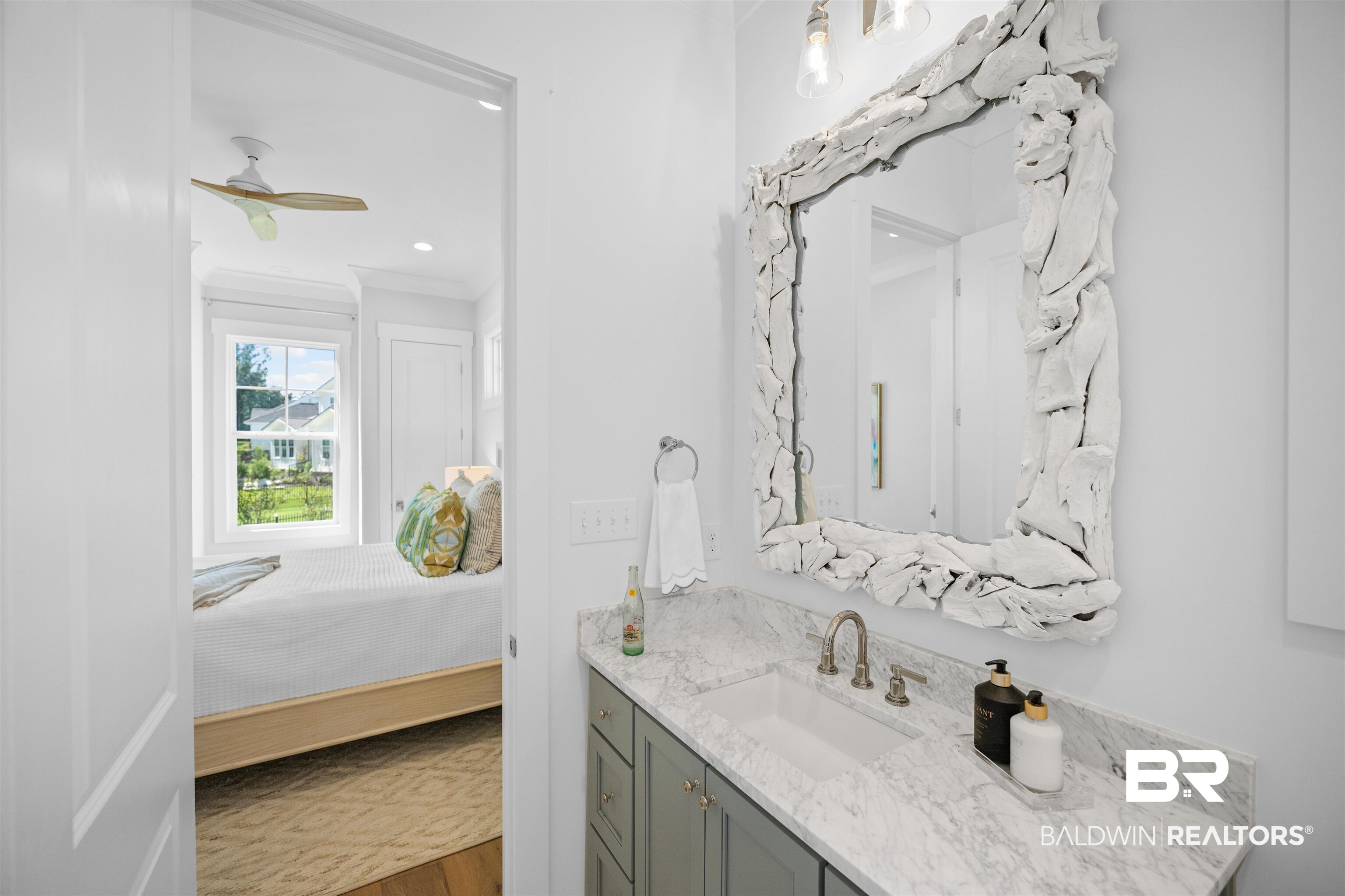 156 Hyacinth Street Fairhope, AL 36532 - Photo 54 of 61 Bathroom with vanity, ensuite bathroom, ceiling fan, and dark wood-type flooring