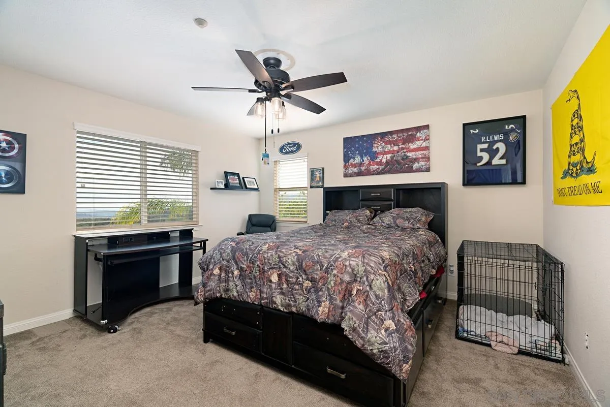 10689 Laurel Path Escondido, CA 92026 - Photo 29 of 48 a bedroom with a bed and a window