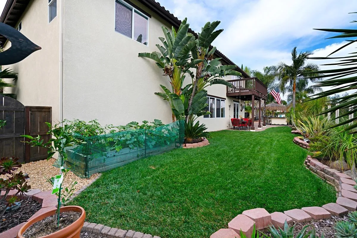 10689 Laurel Path Escondido, CA 92026 - Photo 33 of 48 a view of a house with a garden