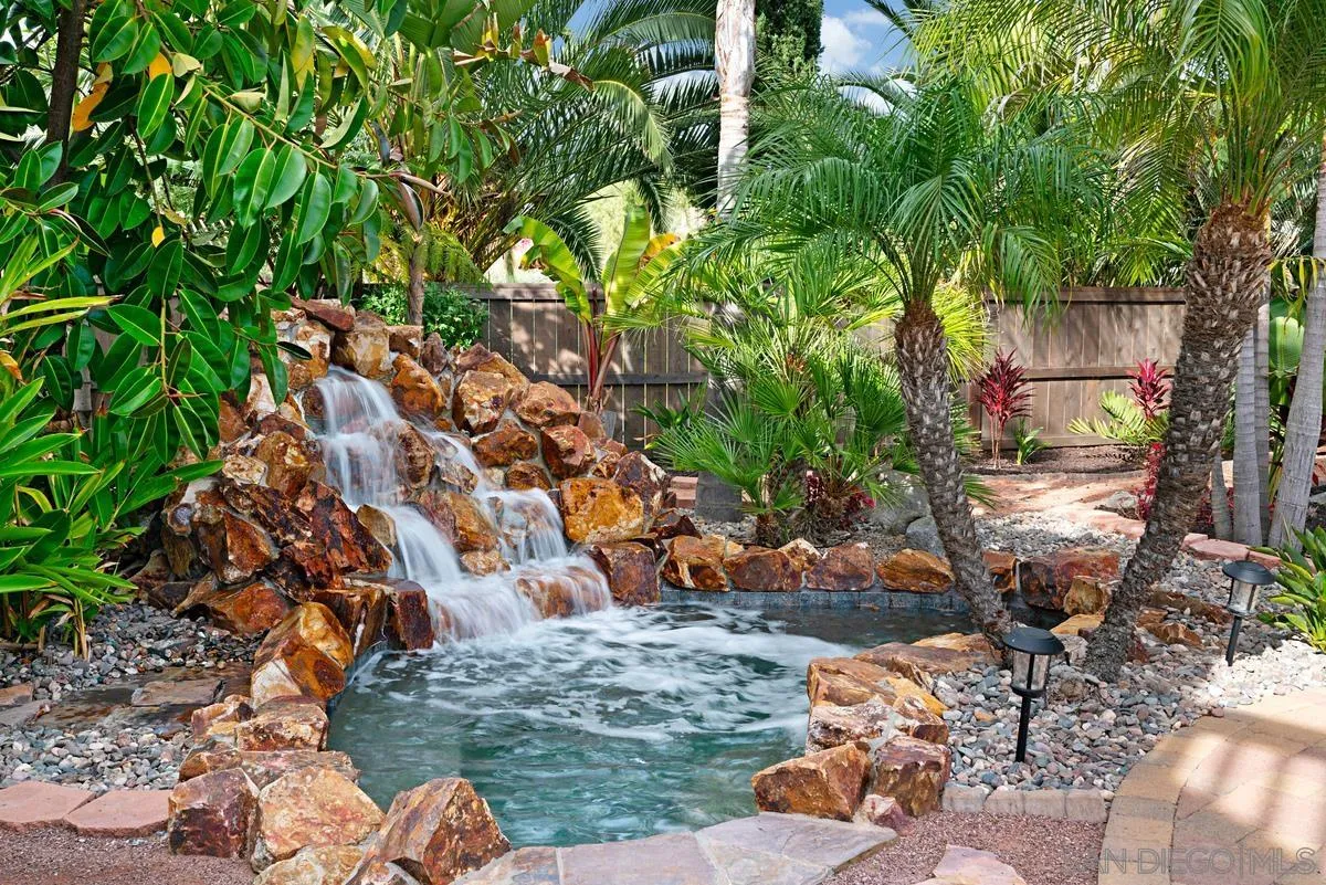 10689 Laurel Path Escondido, CA 92026 - Photo 39 of 48 a backyard of a house with lots of green space