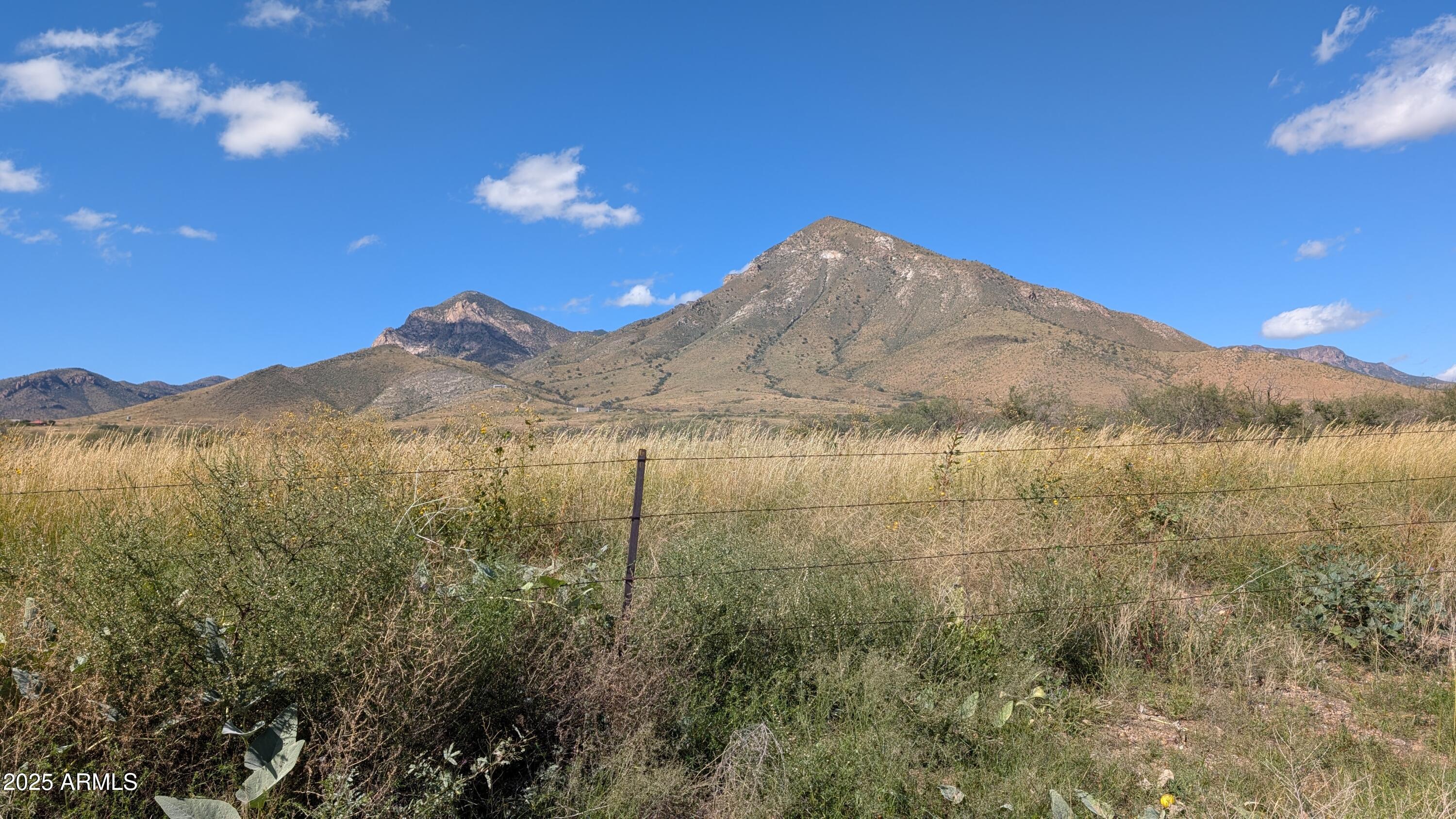 Tbd South Coronado Memorial Road, Unit 50 Hereford, AZ 85615 - Photo 25 of 27 a view of a yard in front of mountains