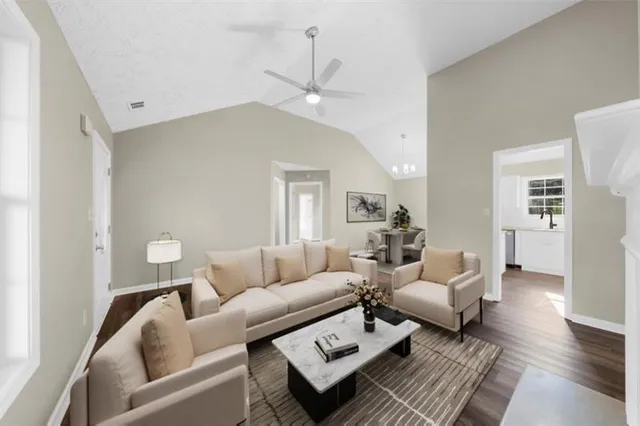 a kitchen with cabinets stainless steel appliances and wooden cabinets