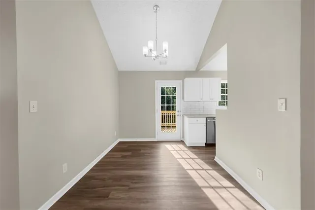 a kitchen that has a sink and a stove