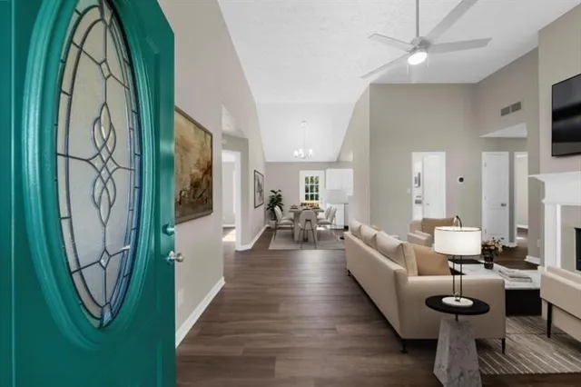 a living room with furniture and a window