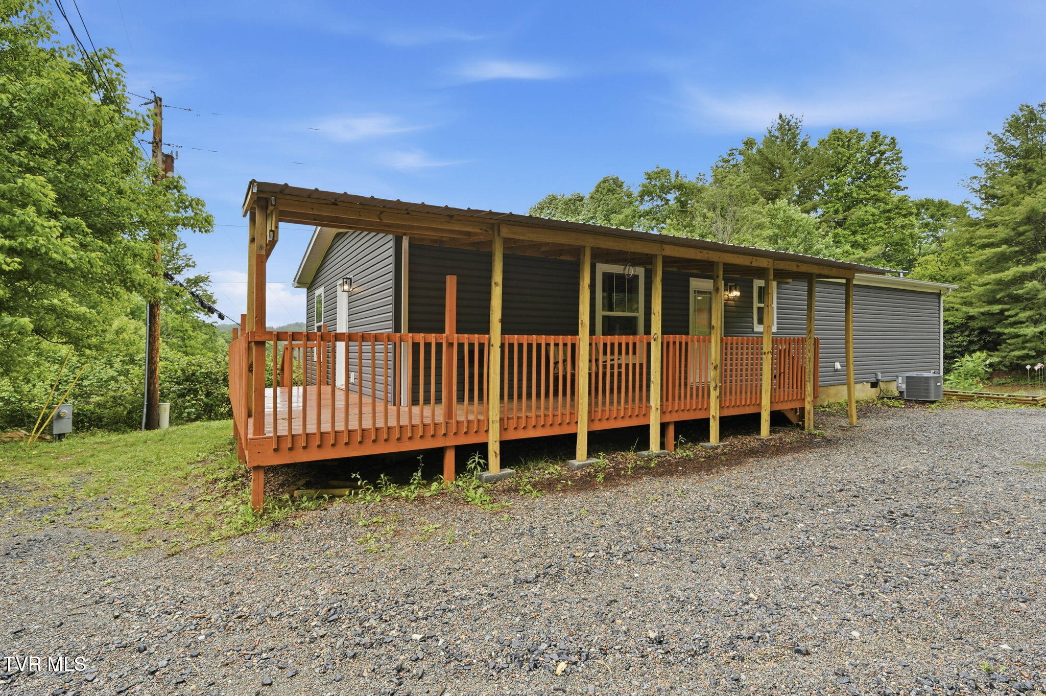 1479 Poga Road Butler, TN 37640 - Photo 30 of 31 wrap around deck