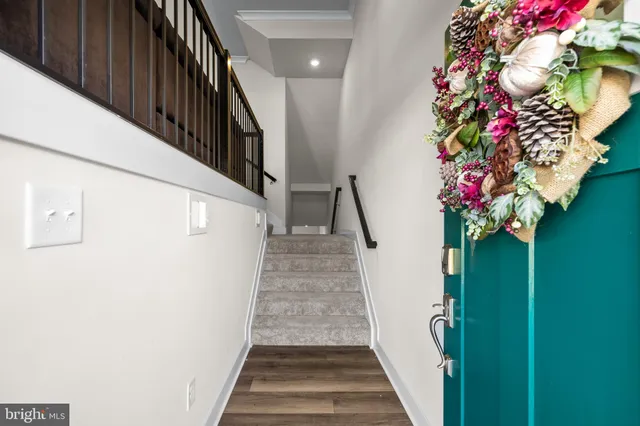 a view of entryway with flower pots