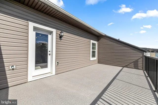 a view of a balcony with a large window