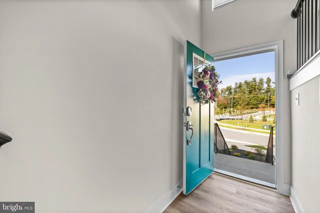 a view of a glass door and a window