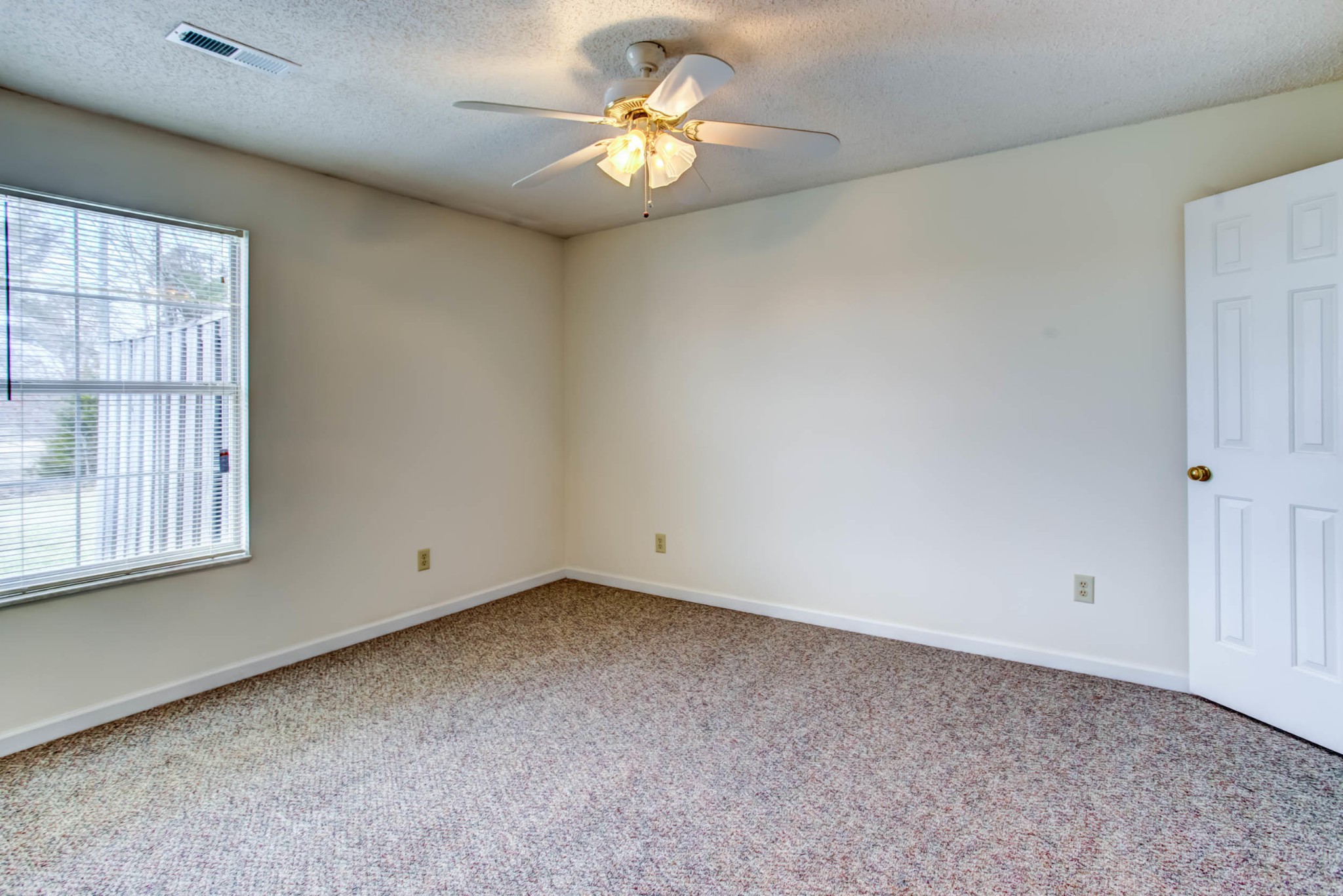1917 Wellbridge Way Powell, TN 37849 - Photo 13 of 19 a view of room with chandelier fan and windows