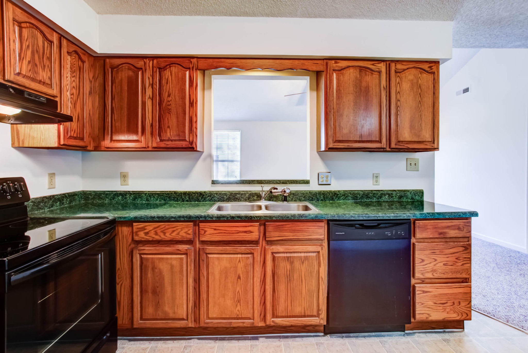 1917 Wellbridge Way Powell, TN 37849 - Photo 10 of 19 a kitchen with stainless steel appliances granite countertop wooden cabinets a sink and a counter space