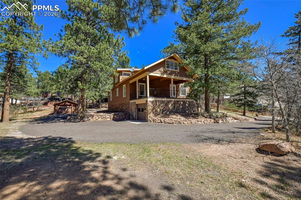 4530 Hagerman Road Cascade, CO 80809 - Photo 44 of 47 East Side Of Home And Circular Driveway
