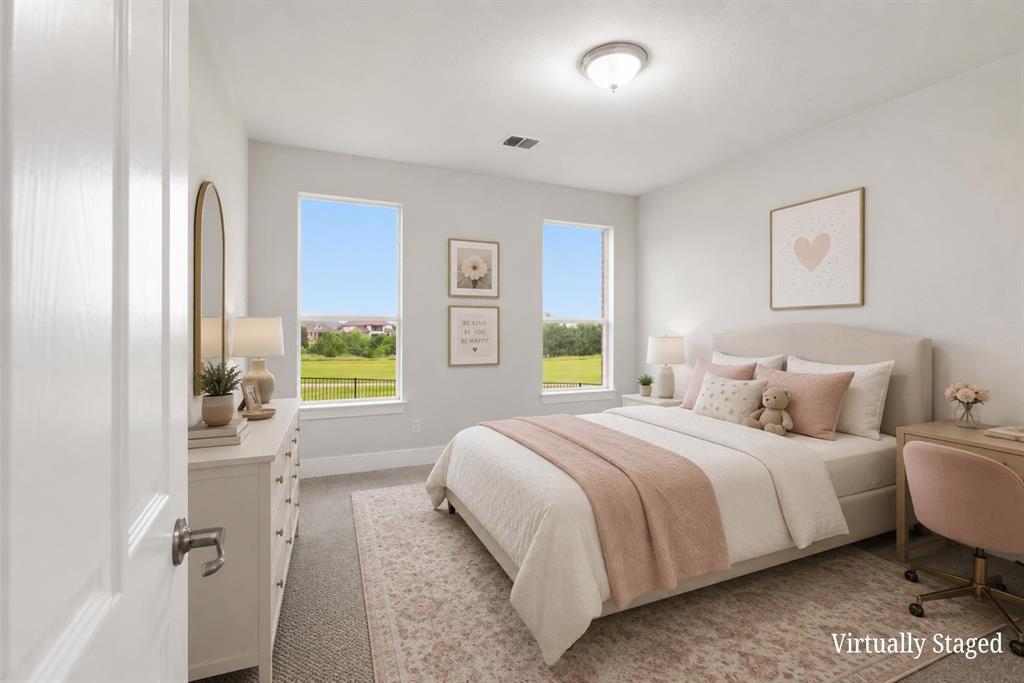 2841 Meadow Ridge Drive Prosper, TX 75078 - Photo 25 of 40 a bedroom with a bed lamps and window