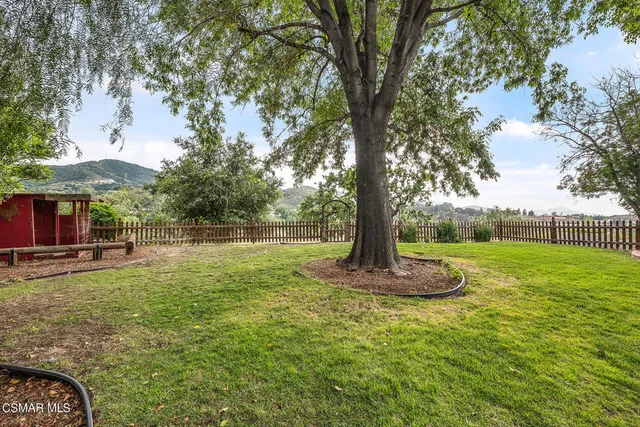 a view of a road with a yard