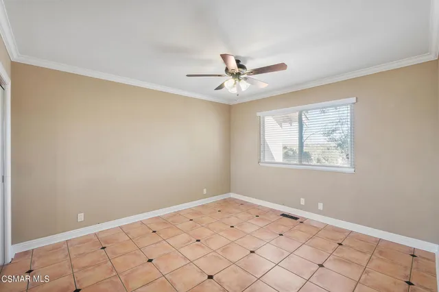 a view of a backyard with sitting area