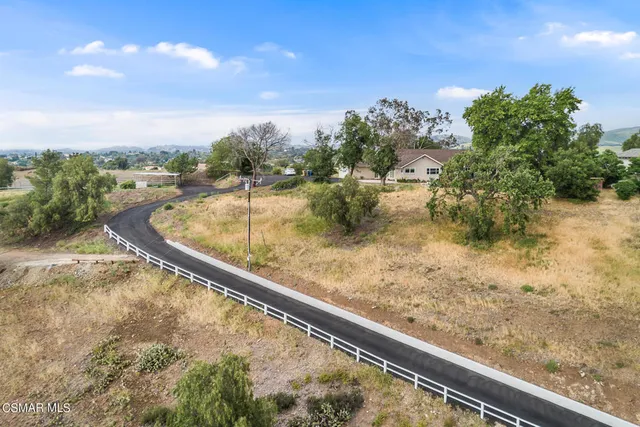a view of a lake from a balcony