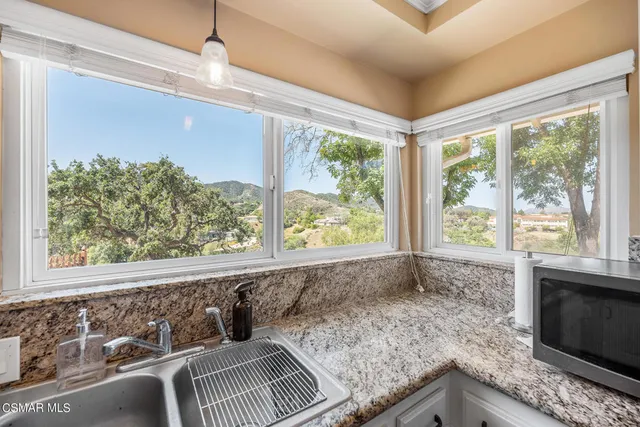 a view of a road with a building in the background