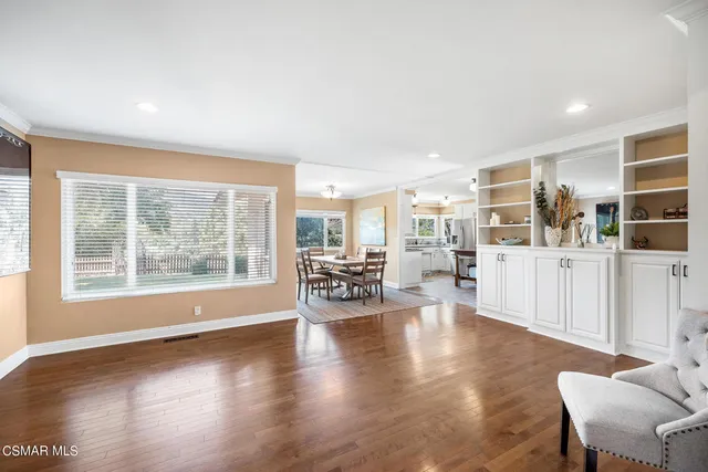 an aerial view of mountains residential house and green space