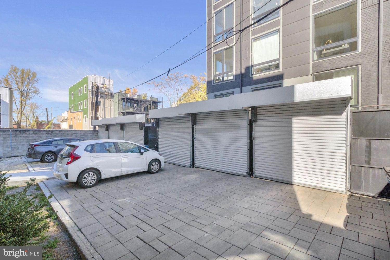 1654 K Street Northeast, Unit 8 Washington, DC 20002 - Photo 16 of 20 a car parked in front of a building