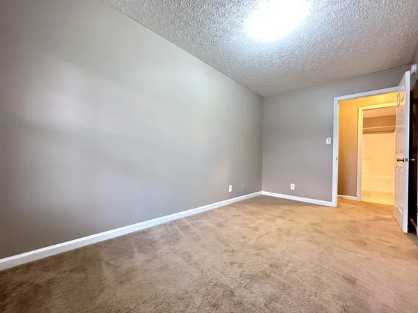 an empty room with a natural light