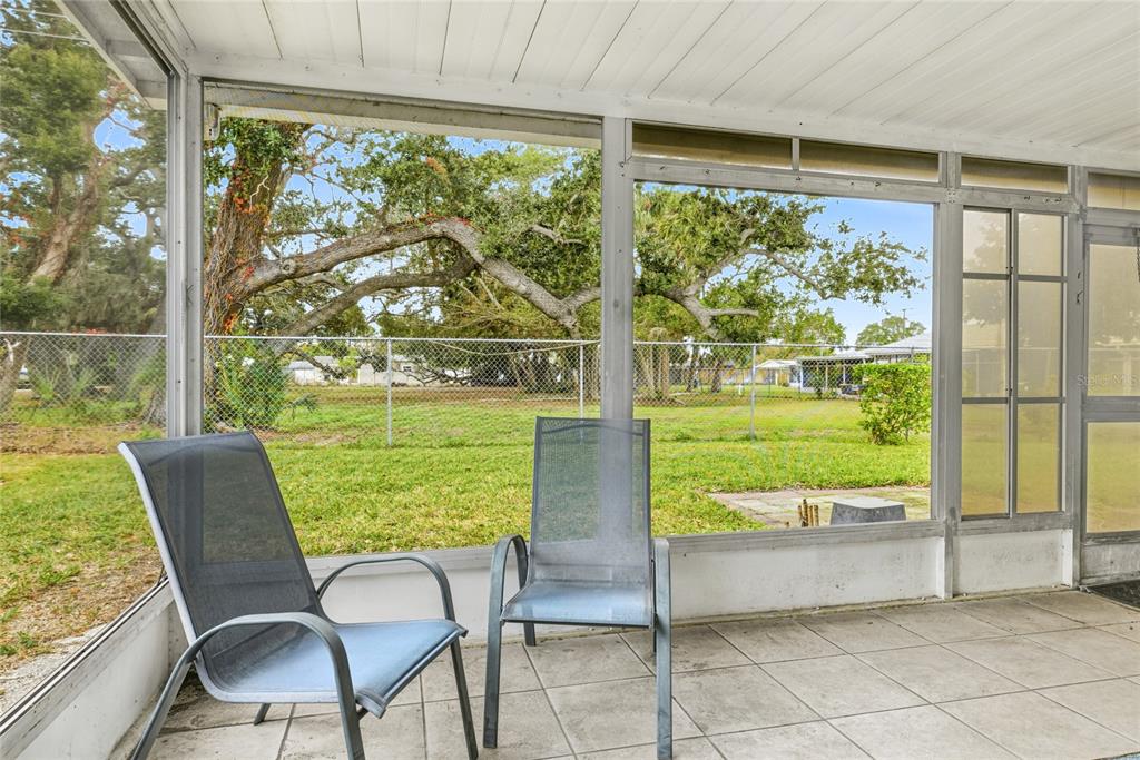 6067 Arlene Way, Unit 5 Bradenton, FL 34207 - Photo 16 of 25 a view of a room and outdoor seating