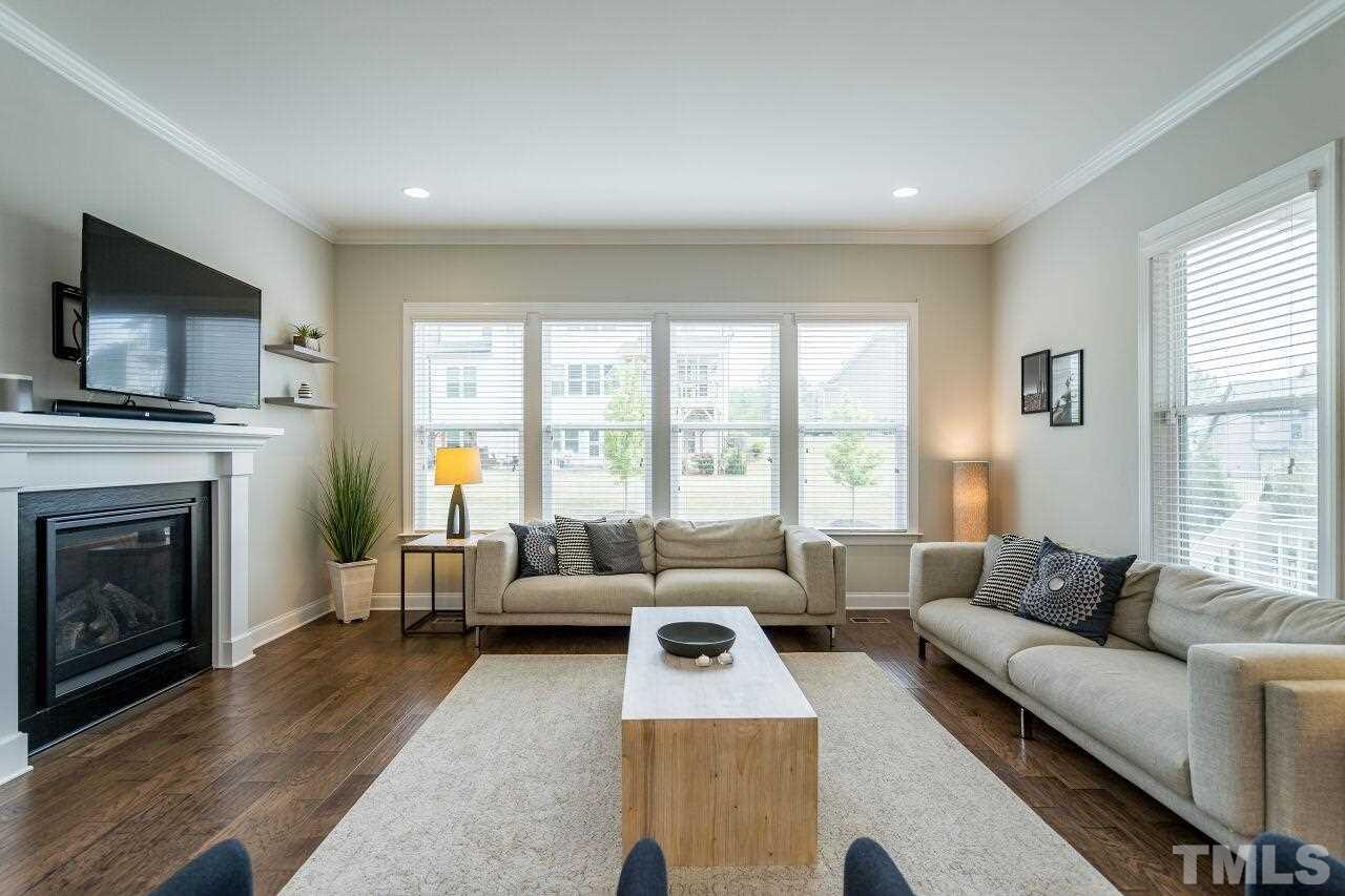 5264 Aleppo Lane Raleigh, NC 27613 - Photo 12 of 30 Sun drenched room makes this open space a favorite in this home.