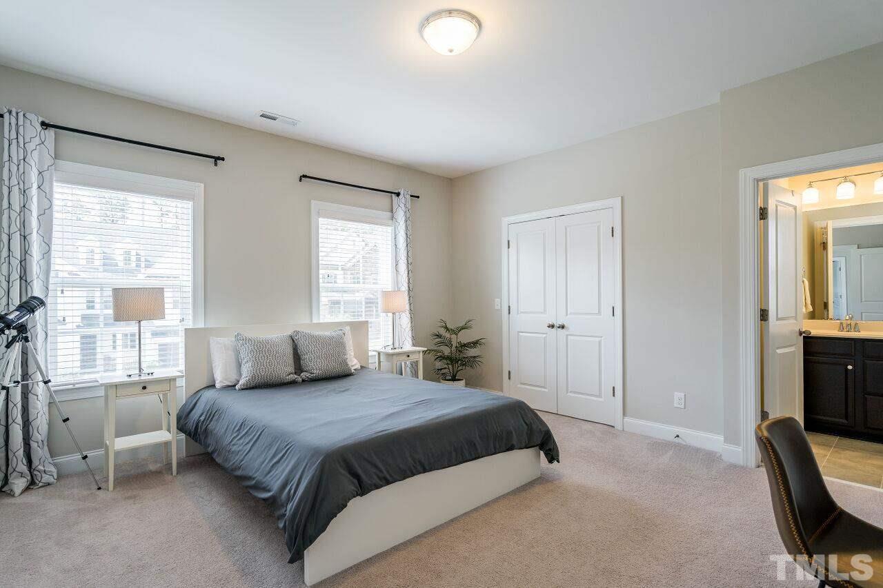 5264 Aleppo Lane Raleigh, NC 27613 - Photo 25 of 30 Front facing upstairs bedroom with en suite bath.