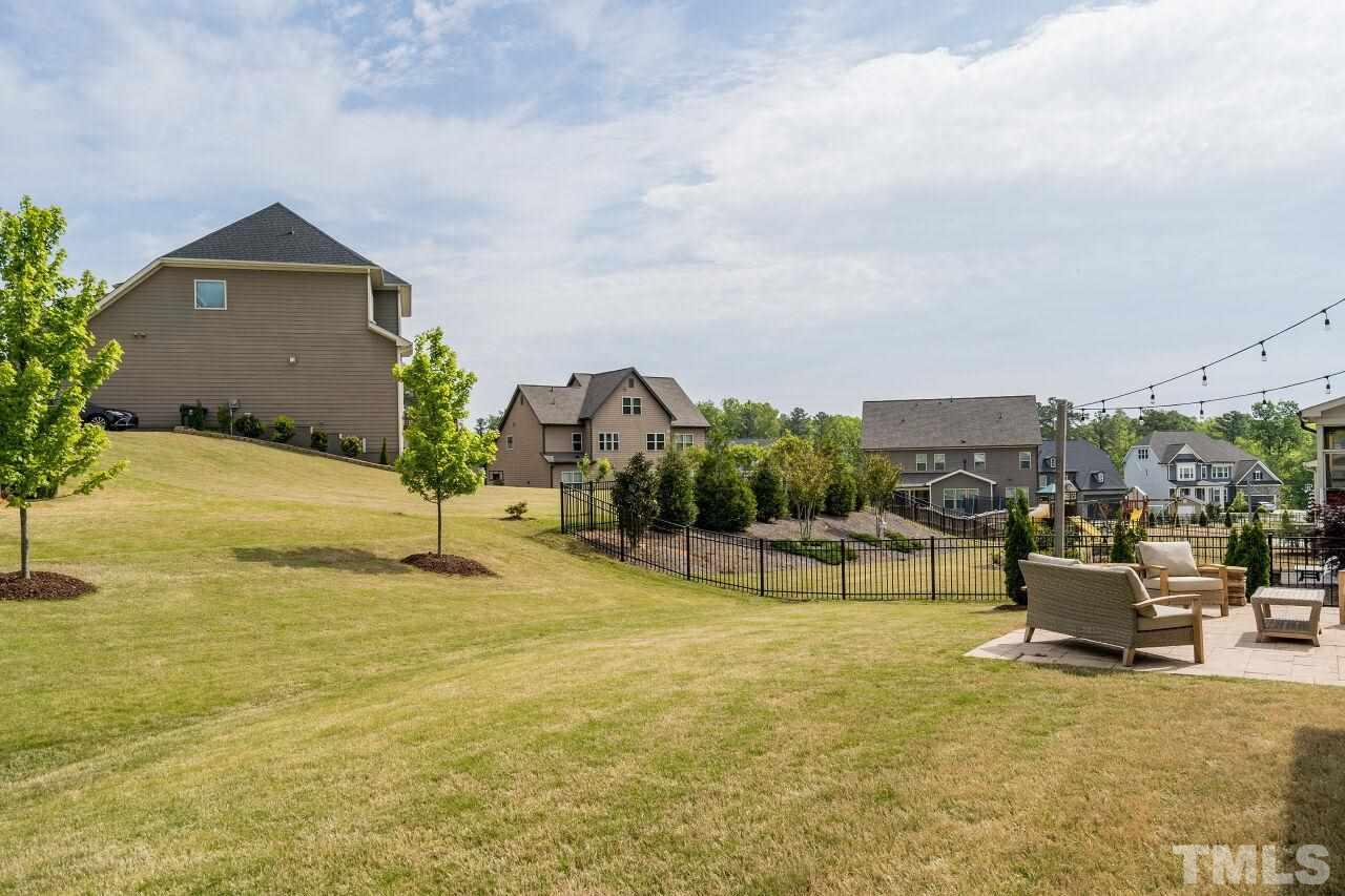 5264 Aleppo Lane Raleigh, NC 27613 - Photo 29 of 30 Easy to use large, grassy backyard.